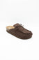 A single dark brown suede mule slipper with a small bow detail on the strap, shown from a side angle against a plain white background.