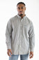A man wearing a long-sleeve button-down shirt with a small white geometric pattern on a light gray background, paired with blue jeans, photographed against a plain white studio background.