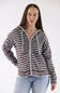 A woman modeling a brown and white horizontally striped zip-up hoodie with white drawstrings, paired with light blue jeans, against a plain white studio background.