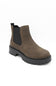 A single brown suede Chelsea boot with black elastic side panels and a chunky black lug sole, shown from a three-quarters angle on a white background.