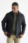 A man wearing a Hallstatt full zip Knit Jacket for Men in Charcoal Grey with two chest pockets.