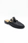 A single black leather mule loafer with a decorative gold-tone metal ring detail across the instep, shown on a plain white background.
