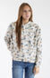 A woman modeling a camouflage-patterned hoodie with blue jeans against a plain white studio background.