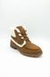 A single brown suede ankle boot with a white shearling-style collar, brown laces, and a brown sole, photographed on a clean white studio background.