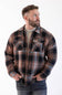 Matix Sherpa Lined Flannel Shacket in Black and Brown showing man wearing shacket