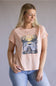 C&C California Lake Tee for Women in Pink; Woman wearing a pink t-shirt with a graphic design on a plain background