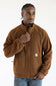 Male model wearing the brown Carhartt Elkhart fleece jacket featuring a full zipper, mock neck collar, elastic cuffs, and the Carhartt logo patch on the left front pocket.