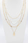 Four Layer Pearl Charm Necklace Set in Gold