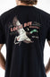 A man wearing a black t-shirt, viewed from the back. The shirt features a large graphic print of a flying mallard duck with the text 'LOCAL BOY OUTFITTERS' and 'EST. 2013