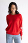 Waffle textured sweater top in a vibrant red color, with thick hems and cuffs