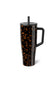 A tall handled tumbler with a black lid and straw, featuring a brown and black tortoiseshell pattern, shown on a plain white background.