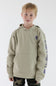 A young boy wearing a light beige Carhartt hoodie with purple branding on the sleeve, paired with camouflage pants, against a plain white studio background.