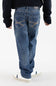 Rear view of a boy wearing Axel Jeans medium-wash straight-leg denim featuring cross-stitched tan embroidery on the back pockets, styled with white sneakers.