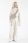 A young girl with long blonde hair smiling and standing facing forward, wearing an oatmeal-colored long-sleeve ribbed quarter-zip pullover with matching wide-leg pants, styled with a plush oatmeal belt bag across her torso on a solid white background.