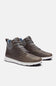 A pair of mid-top lace-up sneakers in a dark brownish-gray leather, featuring gray laces, a white midsole, and a light blue interior lining, shown against a light gray background.