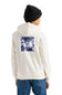 A person shown from the back wearing an off-white hoodie with a large blue and white floral graphic on the back that reads 'THE NORTH FACE'. The person is also wearing a black beanie and blue jeans, photographed against a plain white background.