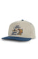 Beige and blue cap, titled the Sendero Provisions Co. Leroy Brown Hat in Khaki/Navy, with fishing-themed design on a white background