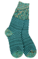 A pair of teal and green patterned crew socks with a knit design, featuring a floral star motif and textured sections, shown against a plain white background.