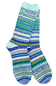 A pair of crew socks with a colorful Fair Isle pattern featuring stripes of blue, green, pink, yellow, and white on a white background.