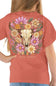 A woman shown from the back wearing a coral short-sleeve t-shirt with a large graphic print of a deer skull surrounded by colorful wildflowers. The brand name 'simply southern' is printed below the graphic.