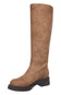 A single knee-high boot in a warm tan-brown suede-like material with a black block heel and sole, shown against a plain white background.