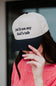 Put It On My Dad’s Tab Trucker Hat for Women in Black/Tan