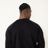 The North Face Evolution Crew Sweatshirt for Men in Black