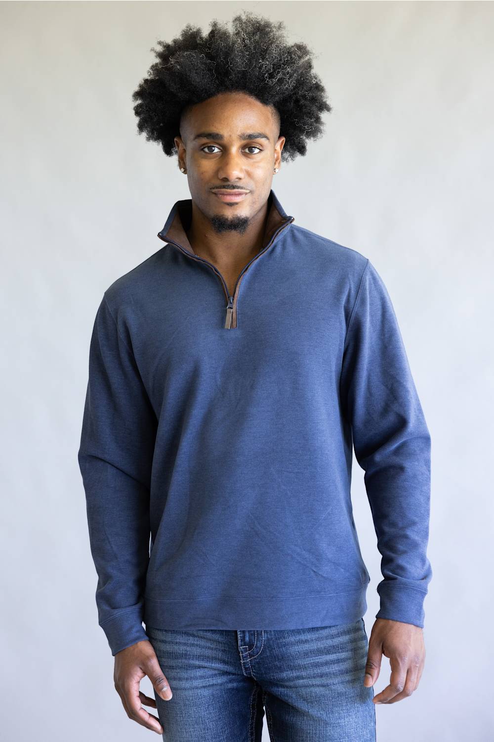 Butter soft, zipneck sweater with brown zipper and collar accents 
