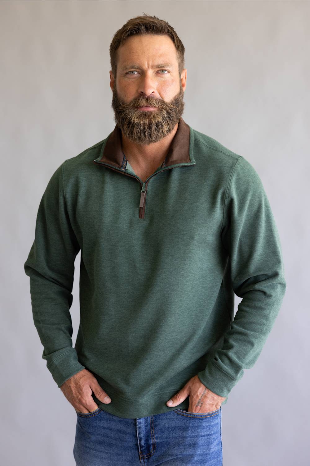 Buttery soft, zipneck pullover with brown zipper and collar accents 
