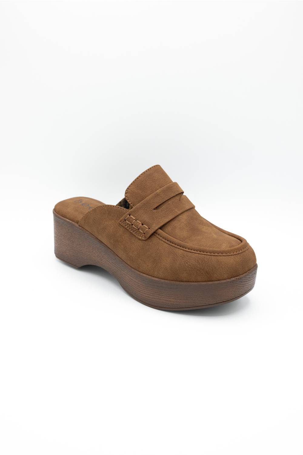 A single brown suede mule slipper with a chunky platform wedge heel, shown from a three-quarters angle on a white background.