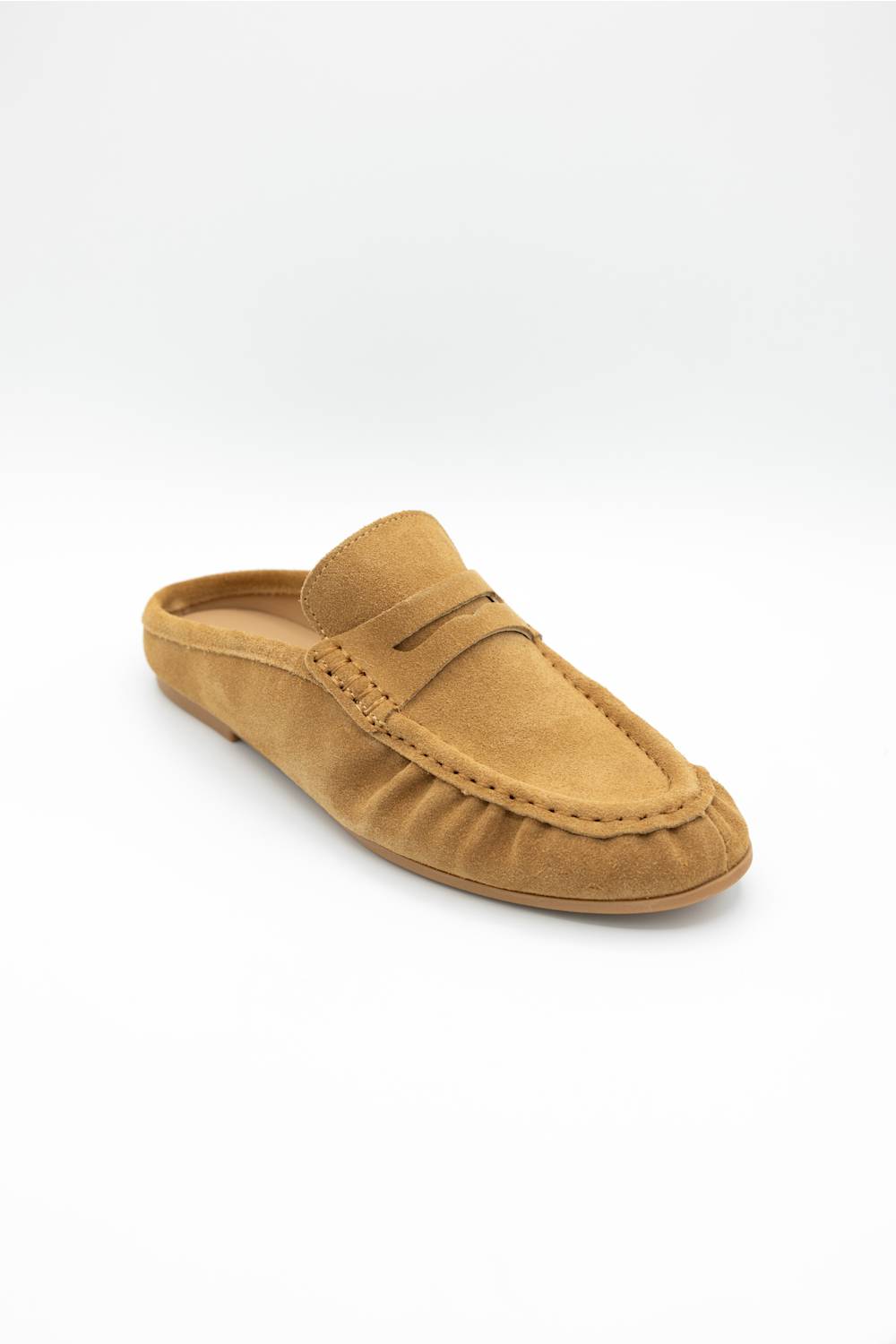 A single tan suede mule loafer shown from a three-quarters angle on a clean white background.