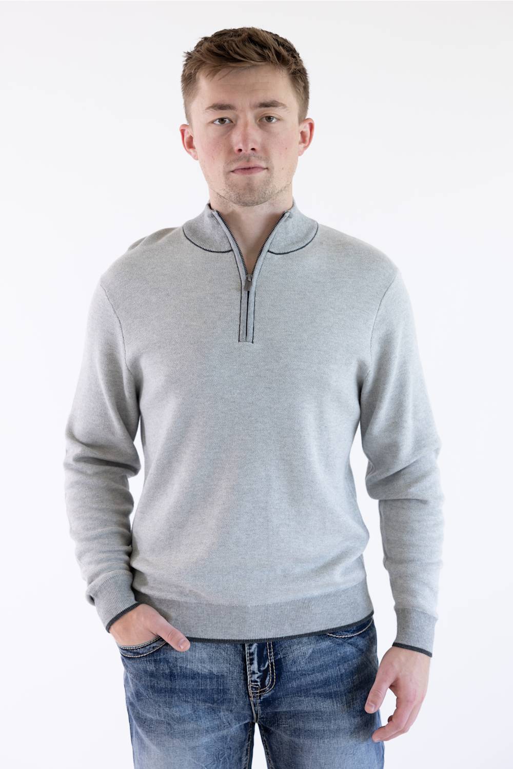 Back view of the F/X Fusion platinum gray birdseye knit quarter-zip pullover, showcasing the ribbed hem and contrast trim detailing.