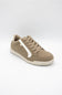 A low-top sneaker in taupe brown suede with a contrasting white side stripe, matching laces, and a white outsole, shown on a light gray background.