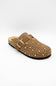 A single brown clog-style mule shoe with a dotted pattern, a wide strap with a gold-tone buckle, and a cork-look midsole, photographed on a light gray background.