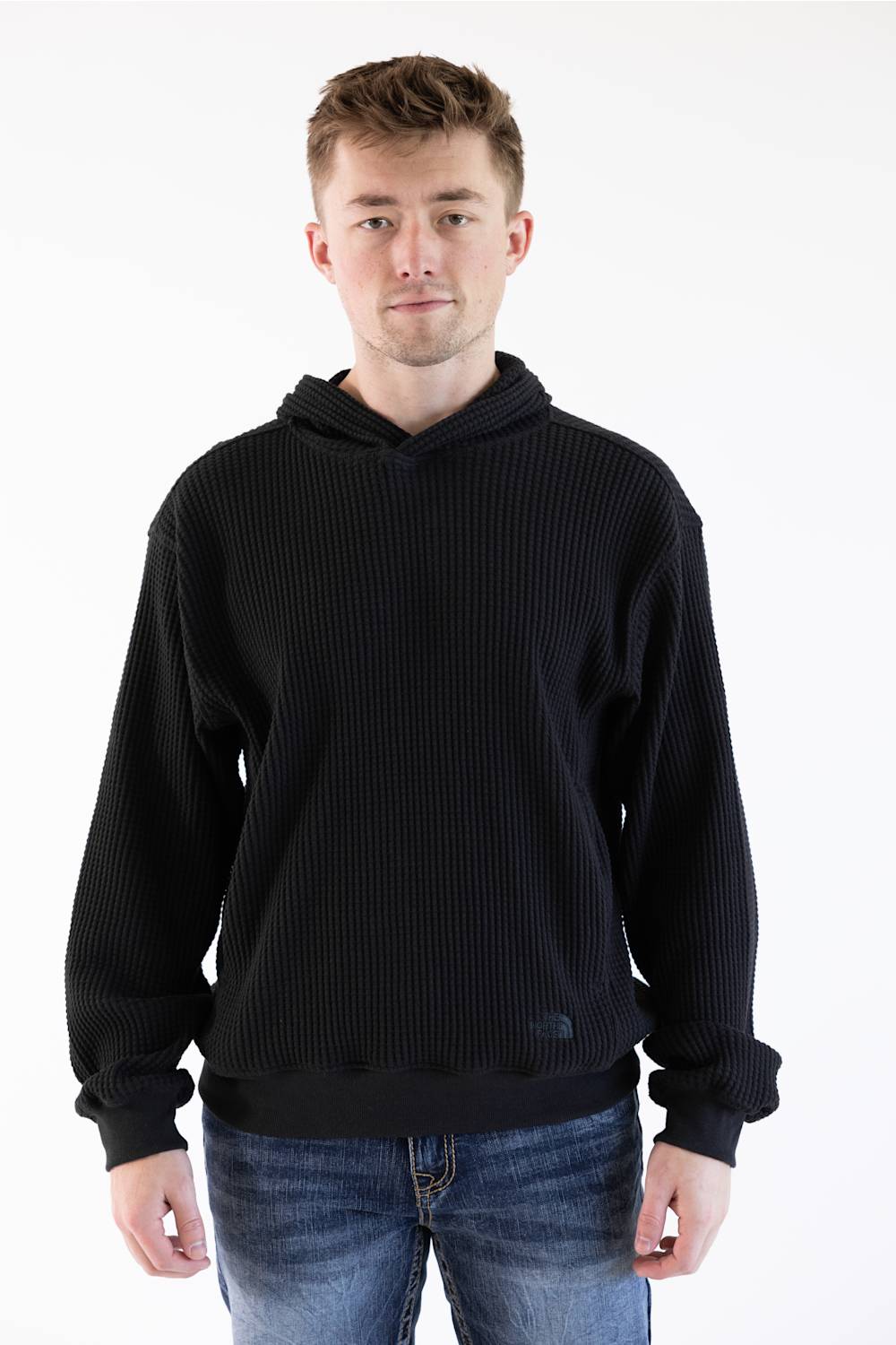 black hoodie on man