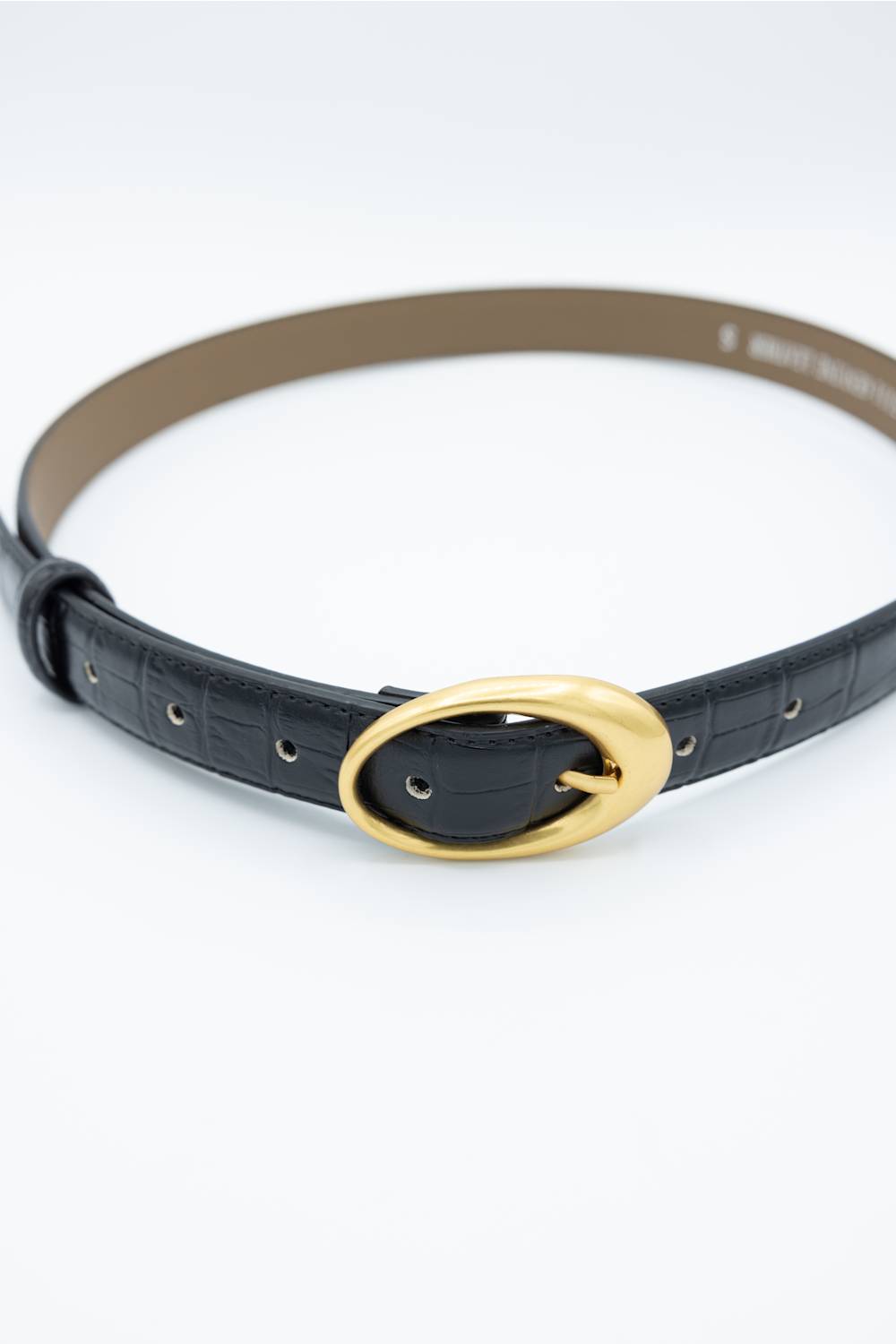 A black crocodile-embossed leather belt with a polished gold oval buckle, displayed on a clean white background.