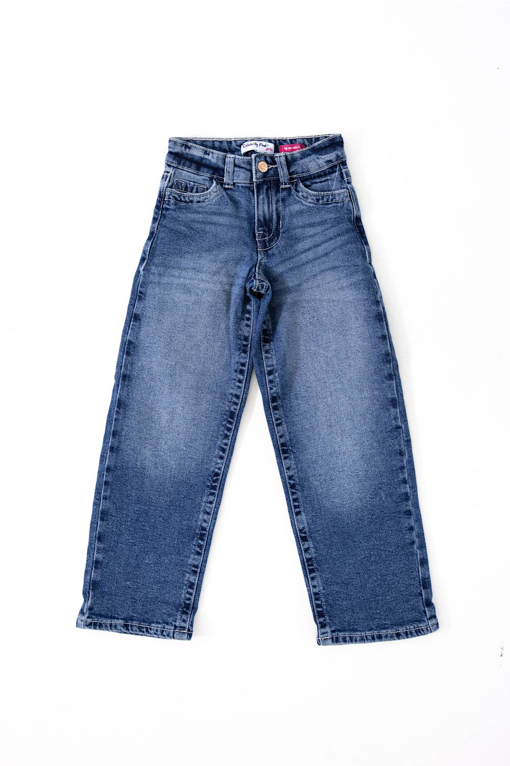 Front view of Celebrity Pink youth girls' baggy wide-leg jeans in a medium wash denim laid flat against a white background.