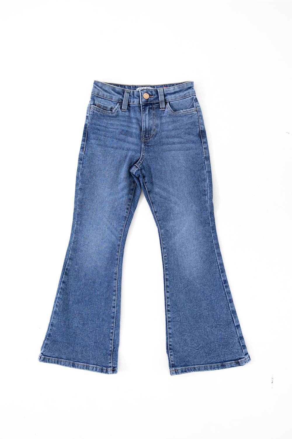 Celebrity Pink girls medium wash flare jeans with a button-and-zip fly and front whiskering.