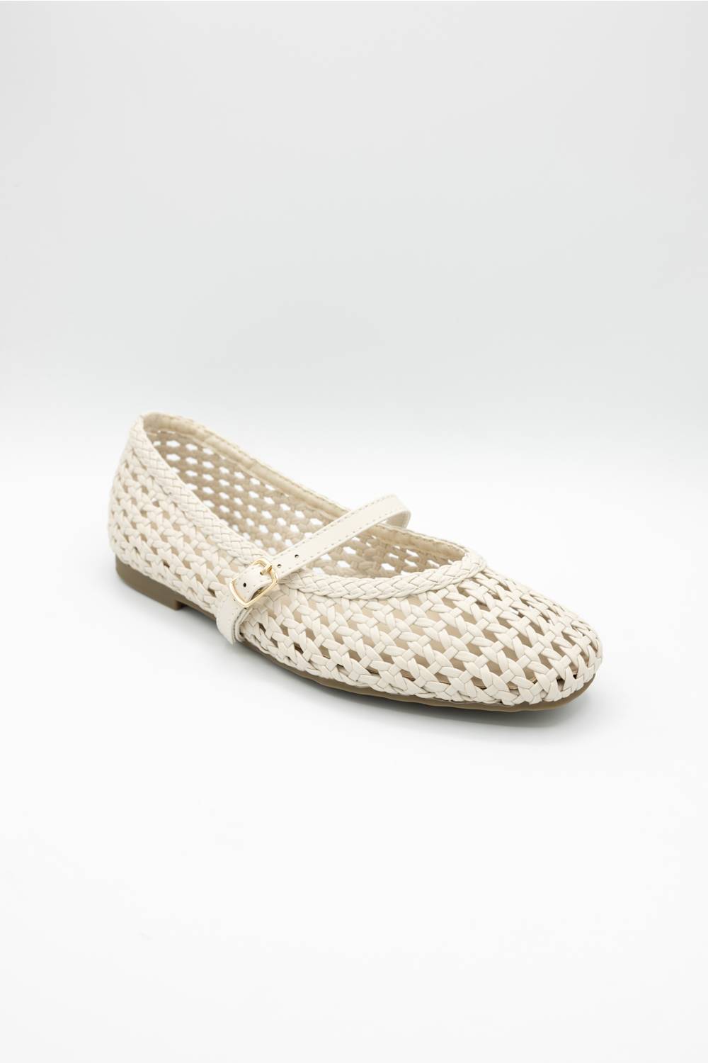 A single cream-colored woven mesh Mary Jane flat shoe with a small gold buckle, shown on a light gray studio background.