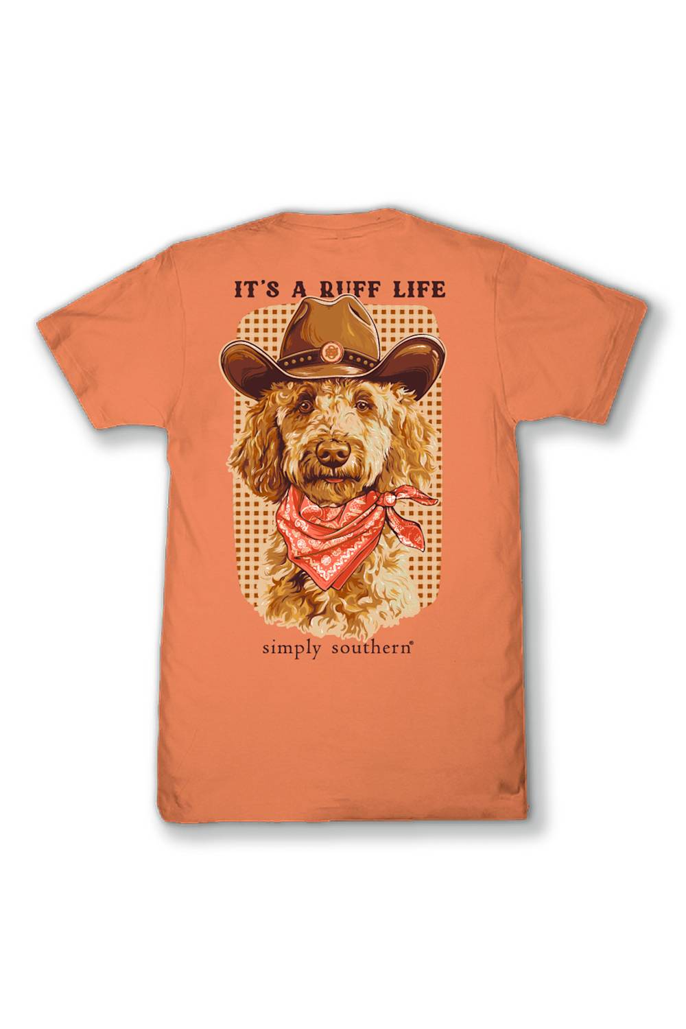 An orange short-sleeve t-shirt with a graphic print of a golden doodoodle wearing a cowboy hat and bandana, with the text 'IT'S A RUFF LIFE' above and 'simply southern' below.
