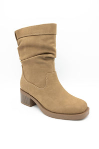 A tan suede ankle boot with a slouchy shaft and a low block heel, shown from a three-quarter angle on a white background.