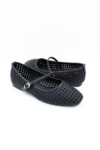 A pair of black woven leather ballet flats with a single strap and a small gold buckle, displayed on a clean white background.