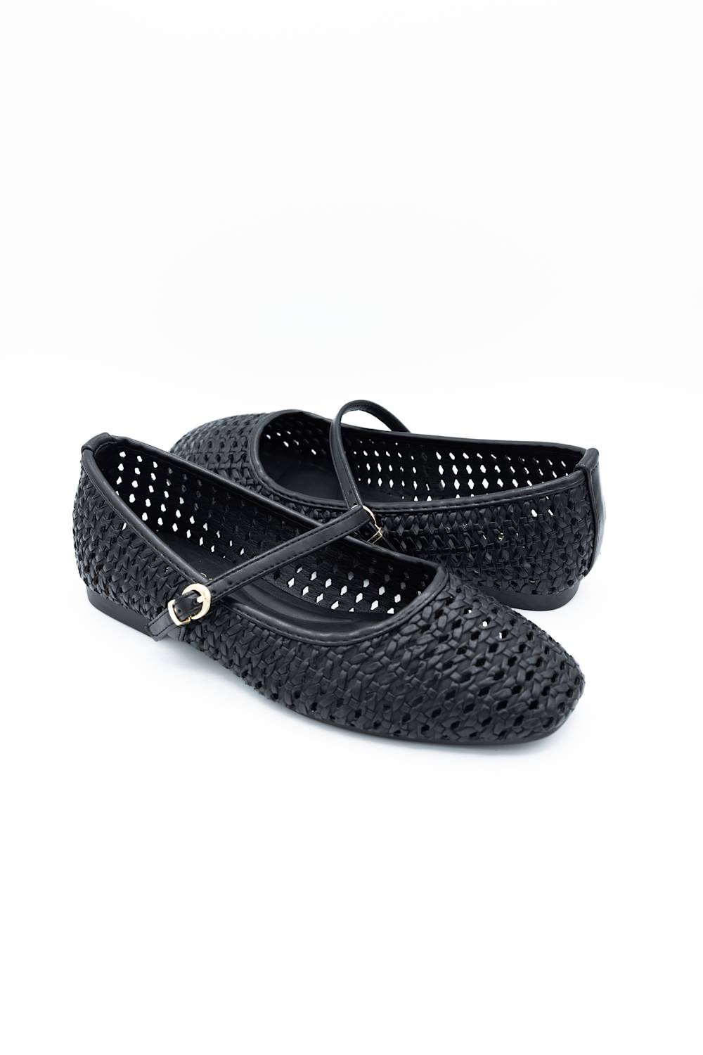 A pair of black woven leather ballet flats with a single strap and a small gold buckle, displayed on a clean white background.