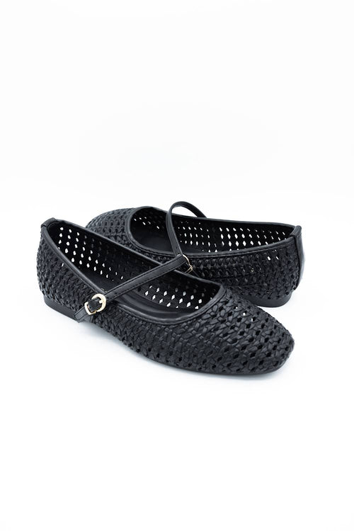 A pair of black woven leather ballet flats with a single strap and a small gold buckle, displayed on a clean white background.