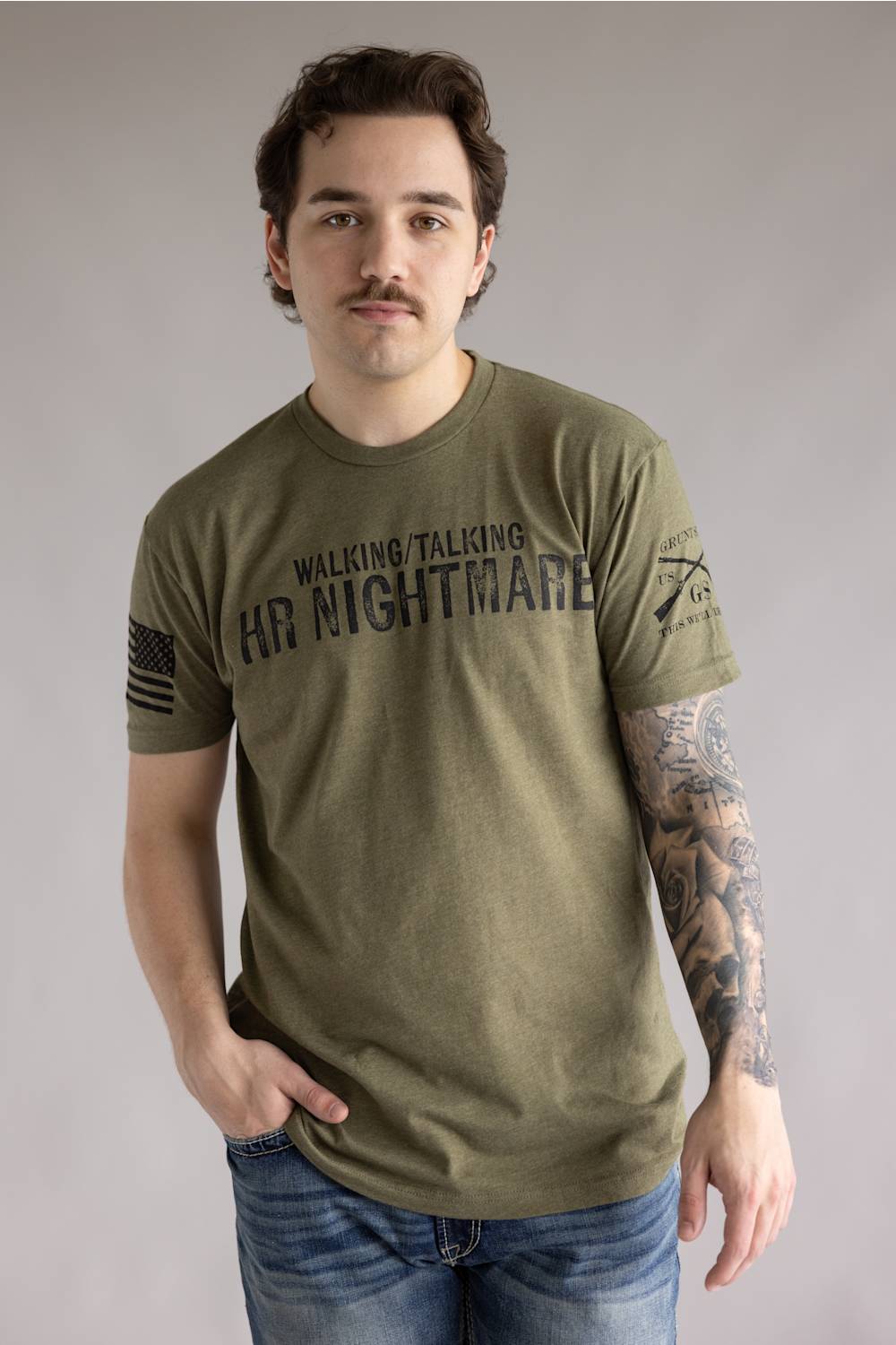 Grunt Style 1776 HR Nightmare T-Shirt for Men in Green; Man wearing a green t-shirt with text and graphics on a plain background