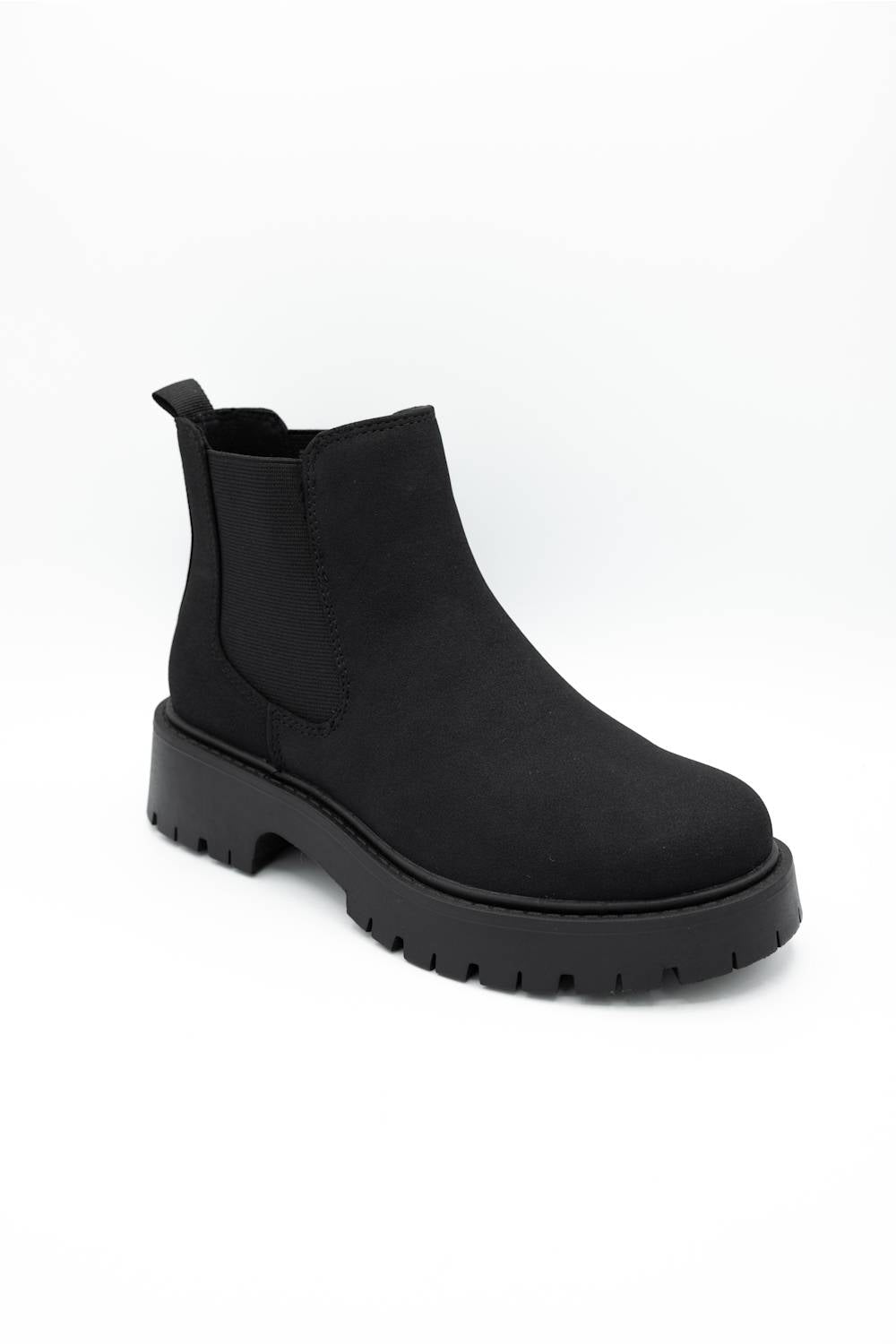 A single black Chelsea-style ankle boot with a chunky lug sole, shown from a three-quarters angle on a plain white background.