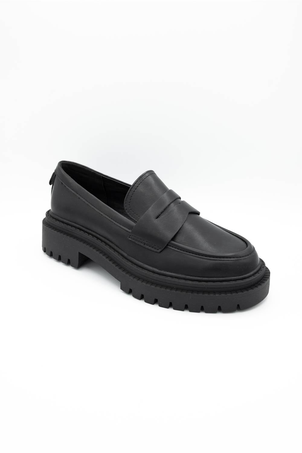 Black dress shoes with textured details on a white background