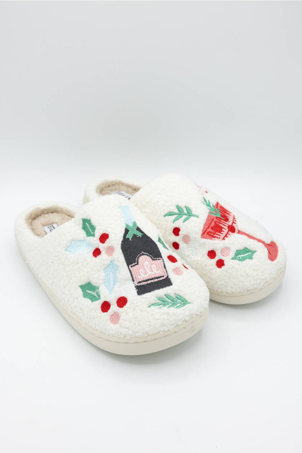 front profile of a white slipper featuring festive holiday drinks 