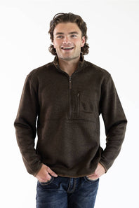 A man wearing the Hallstatt Fleece Quarter Zip Pullover for Men in Heather Brown with a full zip front, knit-like material, vertical zipper pocket on the chest, and front hand pockets.