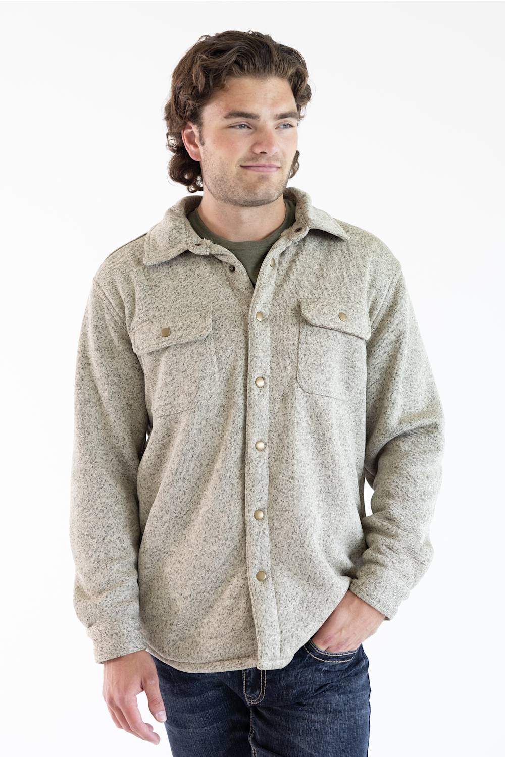 A man wearing a snap up Hallstatt Sherpa Lined Shacket for Men in Oatmeal Heather with two chest pockets.
